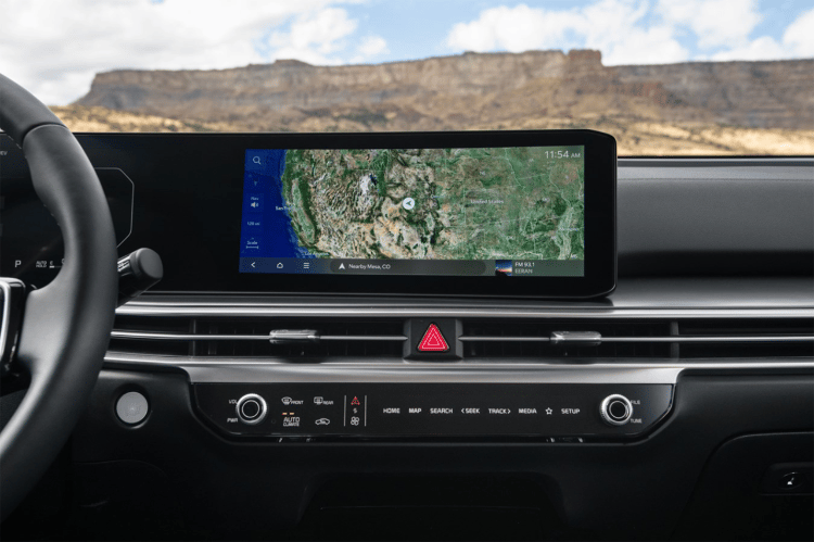  2025 Kia Sorento Hybrid interior, zoomed in view of the dashboard featuring the dual panoramic display