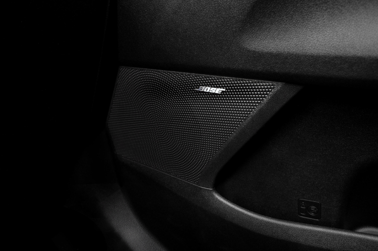 2025 Kia Sorento Hybrid, zoomed in view of the Bose speaker on the interior door