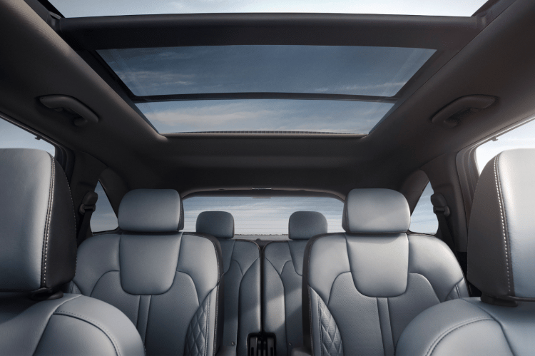 2025 Kia Sorento Hybrid, interior front view of the second and third row with the sunroof above the seats